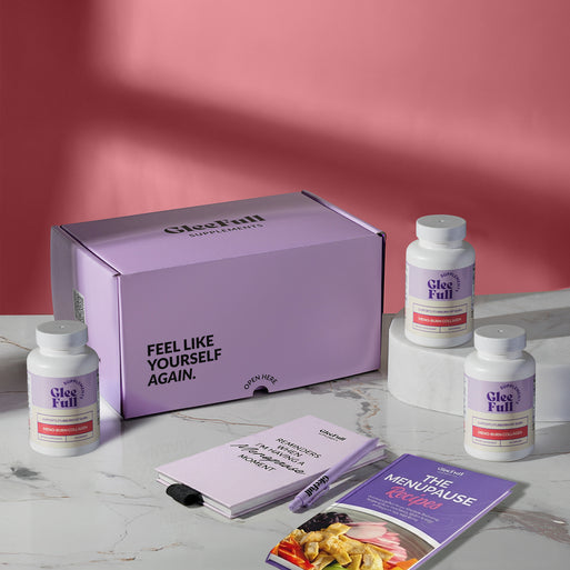 A hand holding a golden supplement capsule against a light background. Pink and purple headline text reads '5 Types of Collagen to Bring Back the Radiant, Youthful Skin Back and Burn That Menopausal Fat Effortlessly.' A purple circular badge reads 'How to Use: Take 2 capsules in the morning or night. Use consistently for effective & faster results.'