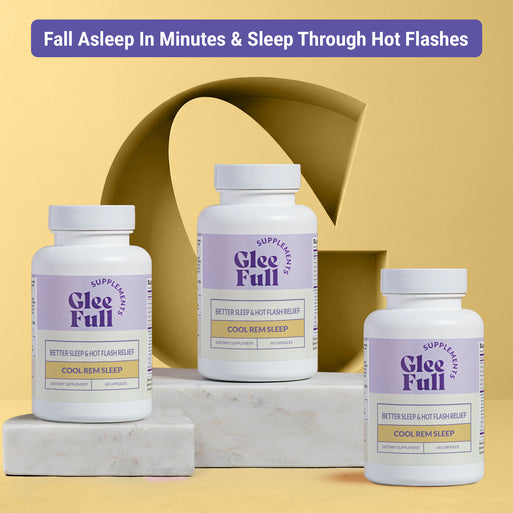 Three white GleeFull Cool REM Sleep bottles on marble blocks against a yellow background. Purple banner reads: 'Fall Asleep In Minutes & Sleep Through Hot Flashes'. Labels read 'Better Sleep & Hot Flash Relief, Cool REM Sleep, 60 Capsules'.