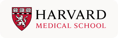 Harvard Medical School logo on a light gray background, featuring the red and white shield crest on the left and the text 'HARVARD' in black and 'MEDICAL SCHOOL' in red.